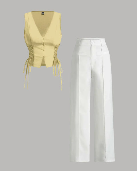 Front view of Vannila corset vest with a bow paired with white high-rise trousers in a stylish two-piece set.