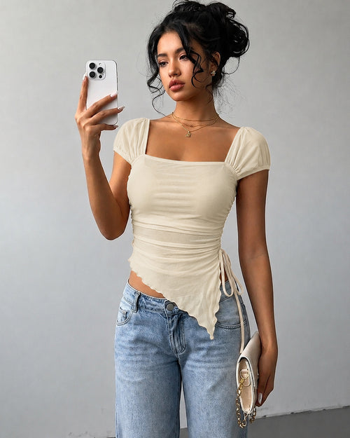 Tie Front Asymmetrical Hem Sleeveless Top in Cream