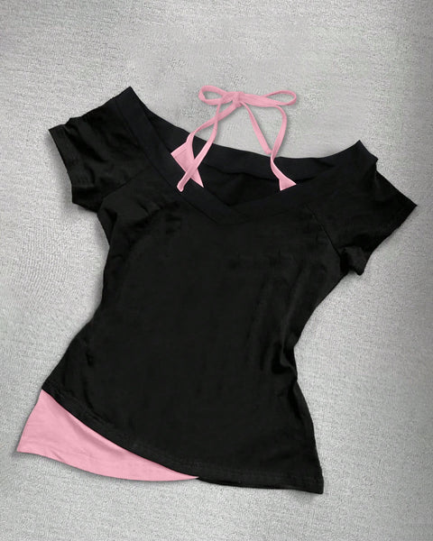 Front view of black short sleeve top with 2 in 1 halter design, fitted silhouette and modern layered look.