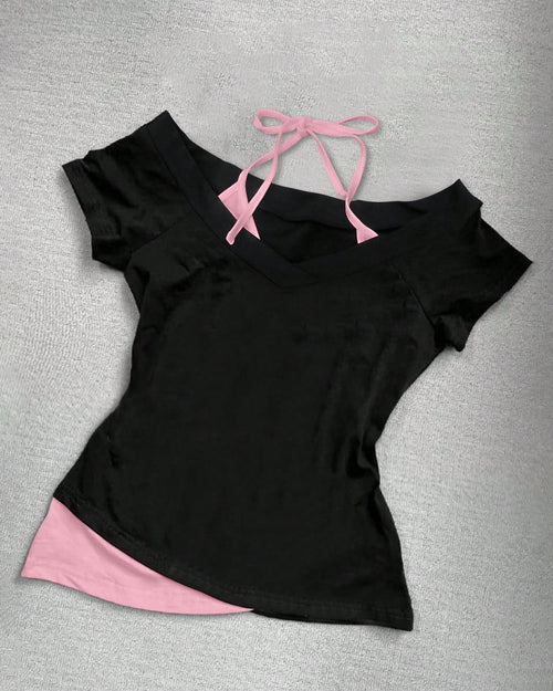 Front view of black short sleeve top with 2 in 1 halter design, fitted silhouette and modern layered look.