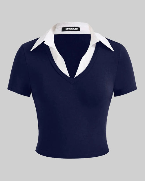 Tight-fitting navy blue t-shirt for women, accented with a contrasting white collar in a color block style.