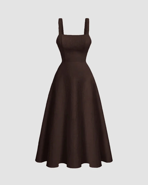 Front view of Backless criss-cross bow design flared dress in chocolate, featuring a square neckline and playful detailing for a flattering look.