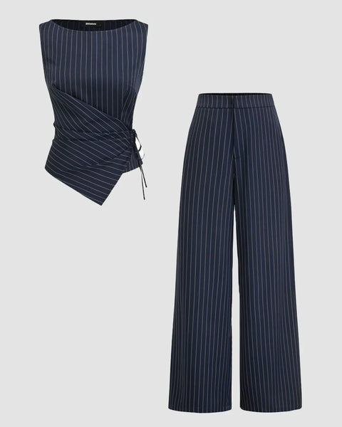 Front view of a pinstripe women's trouser and top set featuring an asymmetrical wrap top and matching wide-leg trousers on a plain background.