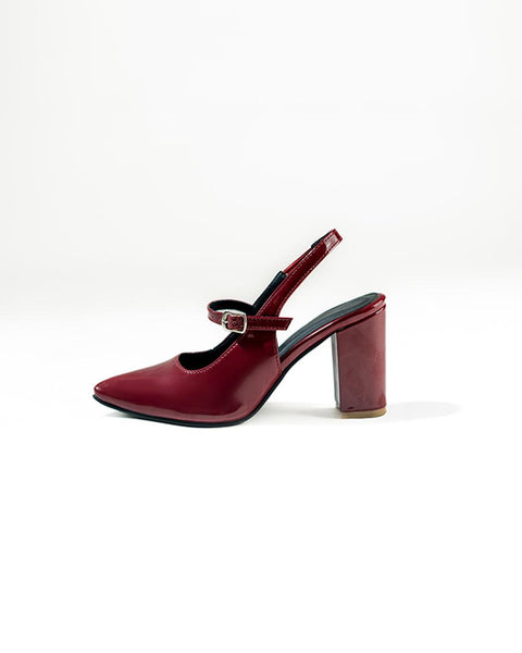 Side view of burgundy block heels with square toe, ankle strap and chunky heel for a stylish statement look.