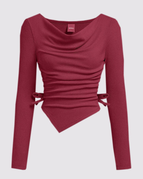 Front view of Maroon crew neck top with cinched waist and asymmetrical long sleeves, made from soft, lightweight fabric