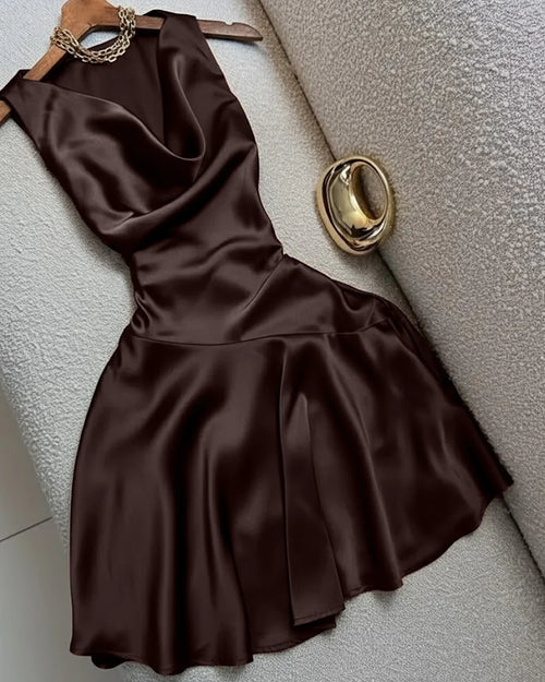 Front view of Brown sleeveless cocktail dress with cowl neckline and flared skirt, smooth satin finish with elegant drape