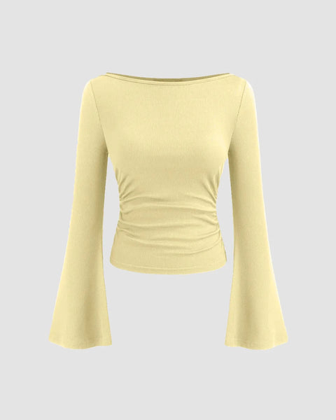 Front view of Boat neck vanilla long sleeve top with ruched detailing for a contoured, elegant fit.