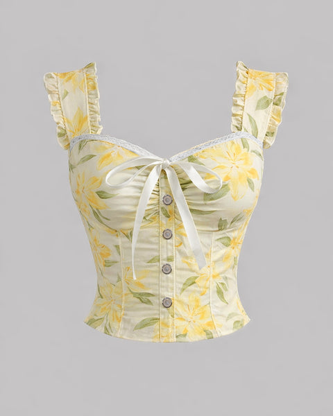 Front view of floral crop top with lace up front, ruffle straps and fitted silhouette for a cute summer look.