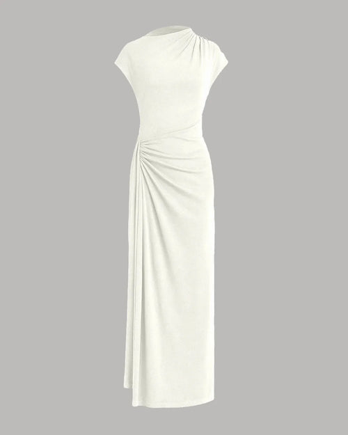 Front view of Milky white high-neck maxi dress with draped waist and front slit, worn by model against studio backdrop.