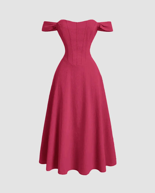 Front view of hot pink one-shoulder dress with a ruffled neckline and faux fishbone design, exuding a romantic style.