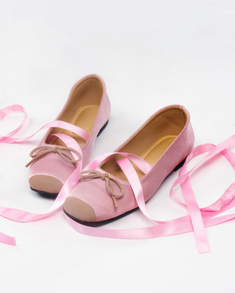 Front top view of pink lace up wrap ballet flats with ribbon tie detail and square toe design, stylish pink flats.