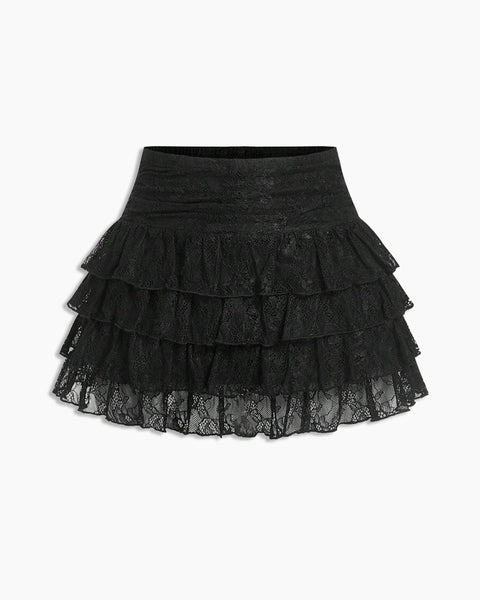 Front view of black lace skirt with ruffle hem, layered design and mini length silhouette for a chic look.