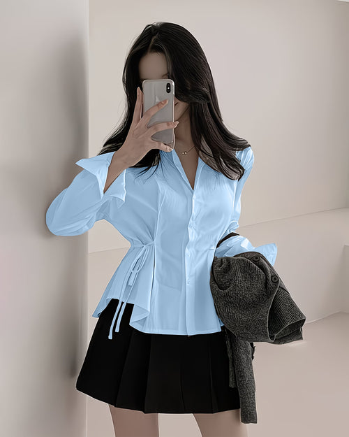 Front view of sky blue plain shirt with long sleeves, waist tie detail and fitted silhouette for a clean look.