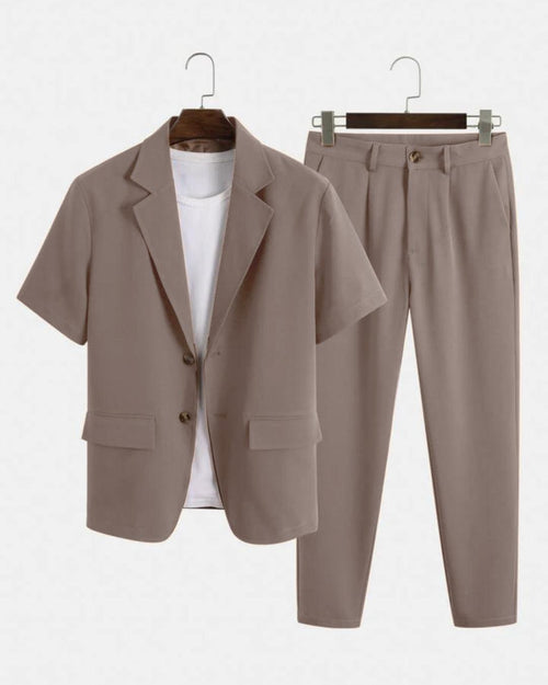 Front view of Brown blazer and pants set with short sleeve blazer, solid color finish, and matching straight leg trousers for men.