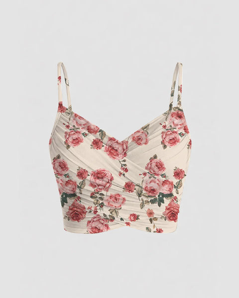 Front view of Floral mesh crop top with a V-neckline, ruched front, and thin strappy shoulders, offering a fitted and feminine summer look.