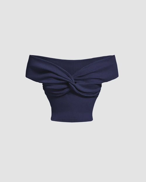 Front view of Navy blue off-shoulder crop top with soft ribbed knit fabric for a sleek, fitted look.