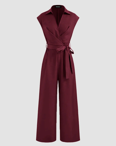 Burgundy cotton jumpsuit featuring a plain collar, pockets, and a belt, designed for comfort and style.