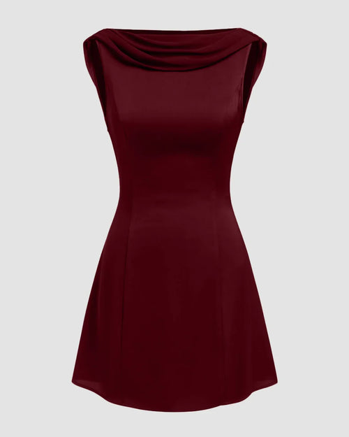 Front view of Red satin mini dress with cowl neck and draped backless design, fit and flare silhouette