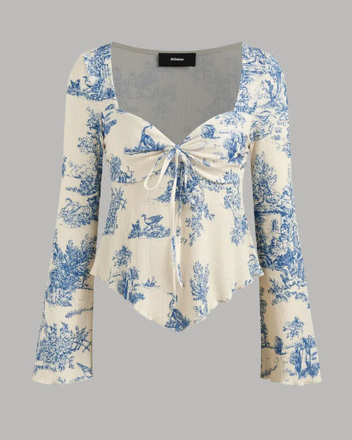 Front view of Bell sleeve long top with delicate floral print and tie-up front, designed for a soft silhouette and stylish everyday wear.