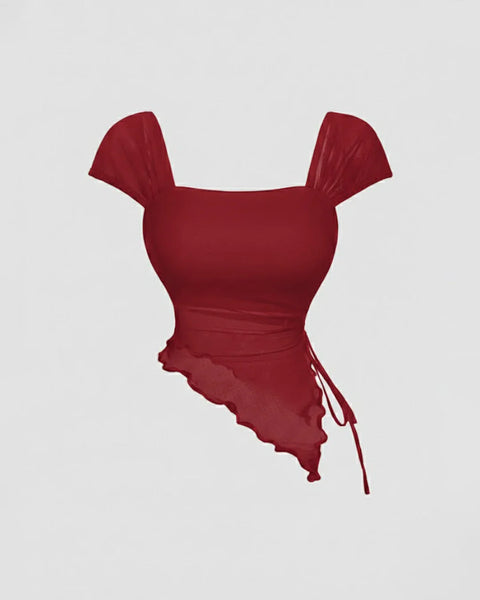Front view of Red fitted short sleeve top with a square neckline and asymmetric ruched hem, featuring side tie detail for a flattering shape