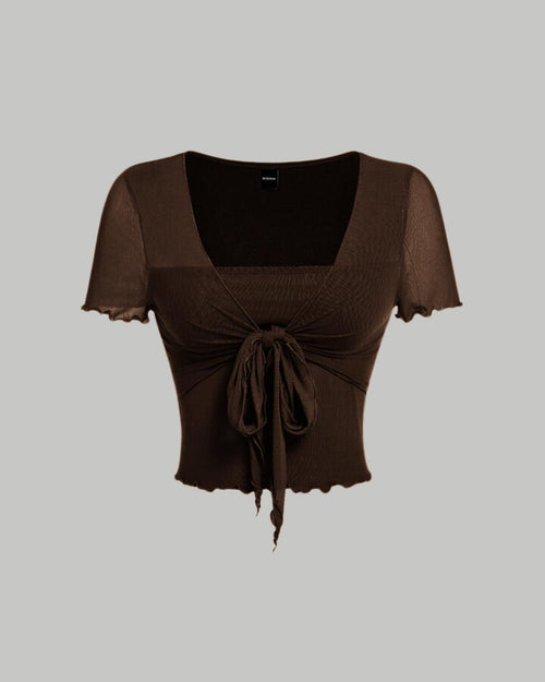 Front view of brown square neck crop top with tie up front detail and short sleeves, stylish tie up front top.