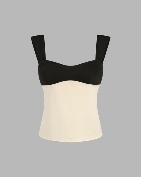 black and white two-tone sleeveless crop cami top featuring a matching bandeau design