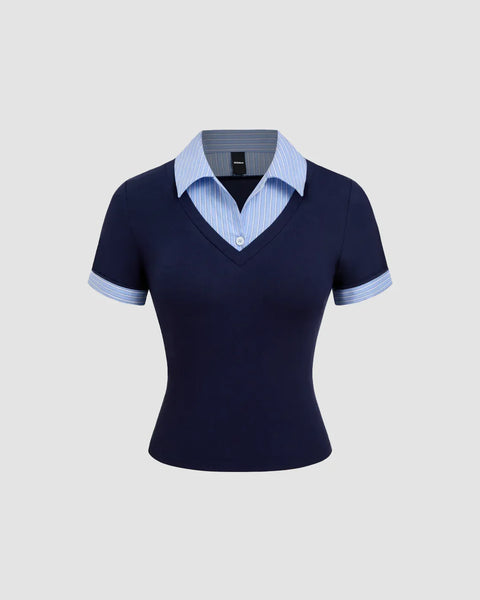 Front view of A navy blue fitted knit top with a V-neck and contrast collar, featuring a polished and smart look.