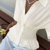 Collared Neck Smocked Waist Flared Hem Top in Off White