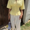 Collared Neck Smocked Waist Flared Hem Top in Butter Yellow