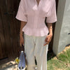 Collared Neck Smocked Waist Flared Hem Top in Baby Pink