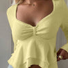 Solid Color Asymmetrical Hem Long Sleeve Top in Vanilla