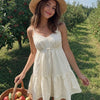 Spaghetti Strap Deep V-Neck Flowy Mini Dress in Classic White