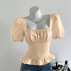 Smocked Peplum Puff Sleeve Top in Peach
