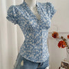 Ruffled V-Neck Curved Hem Floral Short Puff Sleeve Top in Slate Blue