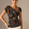 Asymmetric Neck Curved Hem Half Sleeve Printed Top in Soft Black