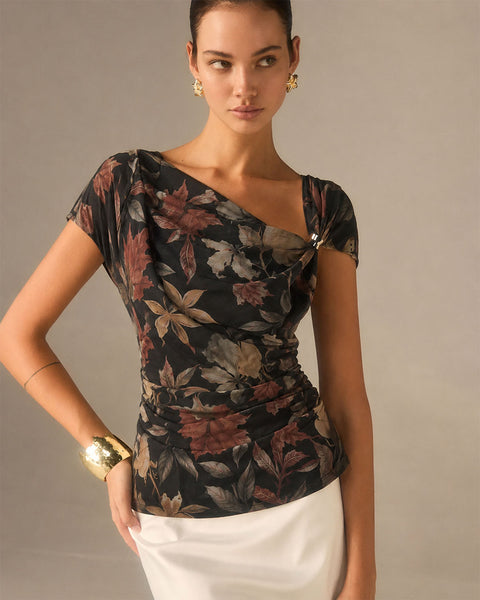 Asymmetric Neck Curved Hem Half Sleeve Printed Top in Soft Black