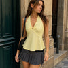 Halter Neck Peplum Top with Front Buckle Detail in Pastel Yellow