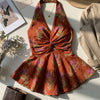 Halter Neck Twist Front Printed Peplum Top in Rust Orange