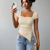 Tie Front Asymmetrical Hem Sleeveless Top in Cream