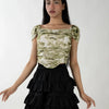 Ruched tie-dye off-shoulder top with voluminous puff sleeves and a sculpted bodice for a playful yet structured look.