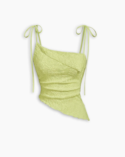 Front view of lemon yellow top with asymmetric hem, tie strap shoulders and textured fabric for a fitted look.