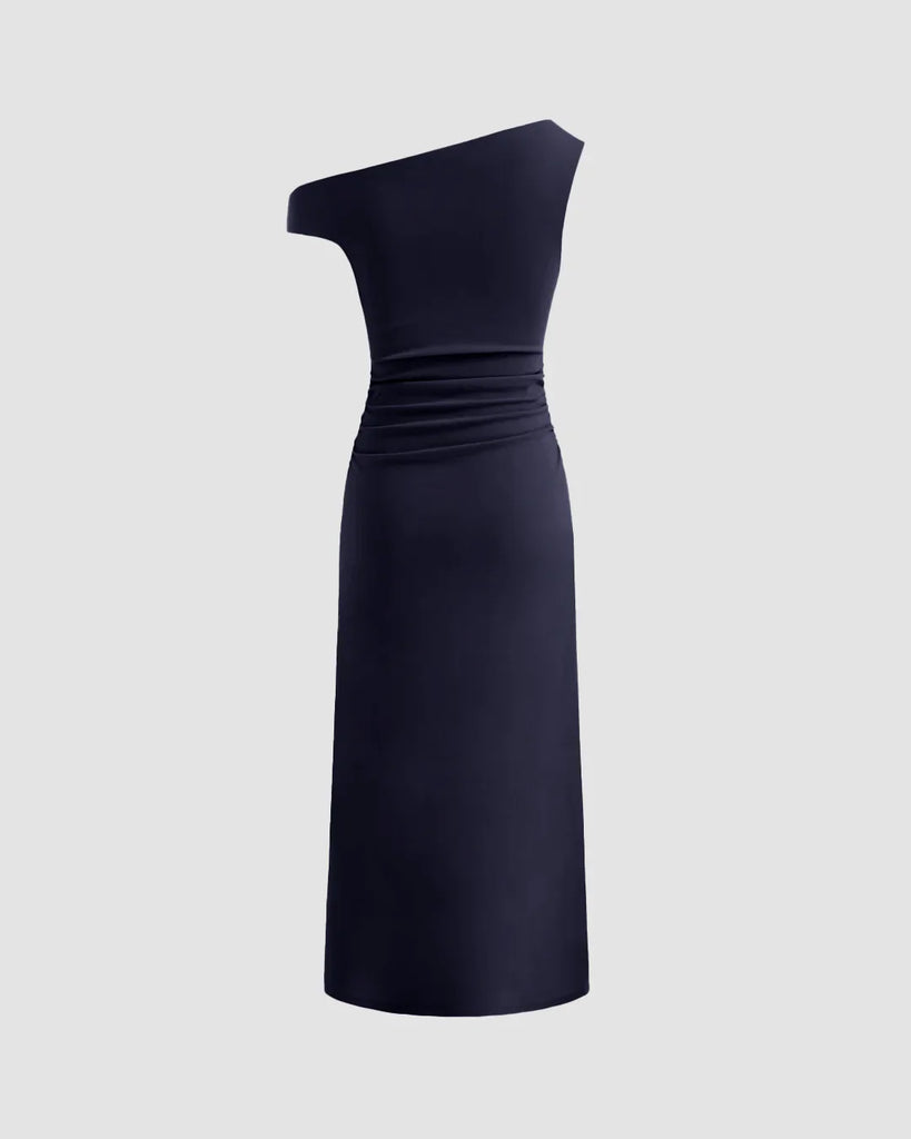 Dark navy asymmetrical midi dress featuring elegant draping and a side slit for a fluid, sophisticated look.