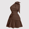 brown asymmetrical mini dress featuring a neck bow tie and cropped waist