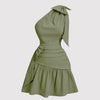 green asymmetrical mini dress featuring a neck bow tie and cropped waist