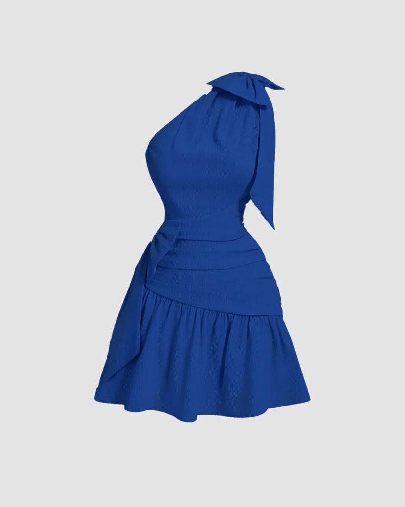 Surf blue mini dress with an asymmetrical neck and a bow tie detail at the front, featuring a cropped waist design.
