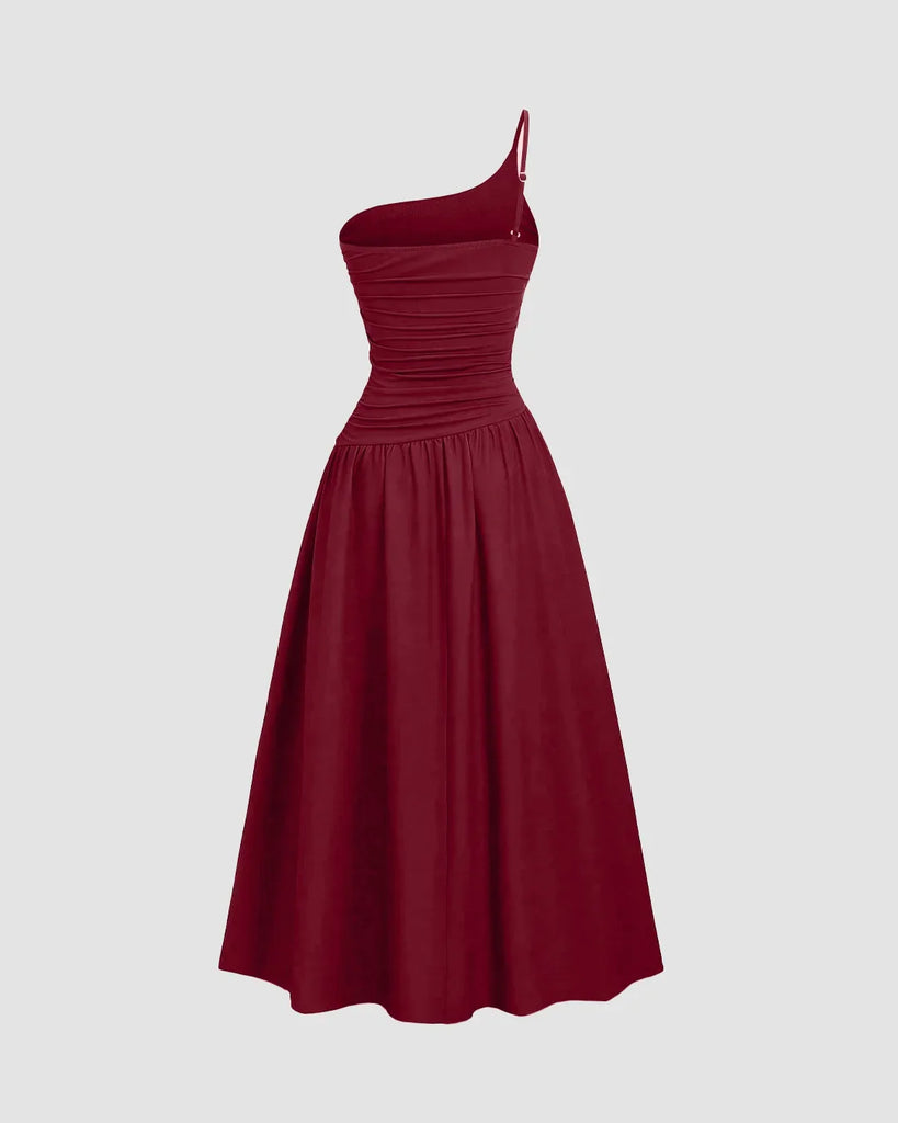 Maroon midi dress featuring a one-shoulder neckline and ruched bodice, exuding bold energy with elegant flair