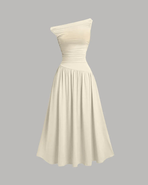 Front view of beige midi dress with asymmetrical neckline, ruched bodice and flowy skirt for an elegant silhouette.