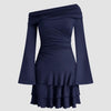 Navy blue asymmetrical mini dress with ruffled sleeves, made from ribbed knit and featuring a ruched layered design.