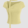 Front view of French vanilla asymmetrical neck top with textured fabric, button-up detail, and attached scarf, designed in a fitted short sleeve silhouette