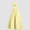 Yellow Back Tie Halter Neck Gathered Midi Dress featuring a ruffled neckline, styled in French Vanilla.
